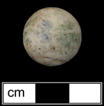 Unglazed porcelain marble with barely visible painted floral motif in blue and green. Similar marbles have been found in archaeological contexts dating c. 1850-1910 (Carskadden and Gartley 1990) - Click images for larger view. 